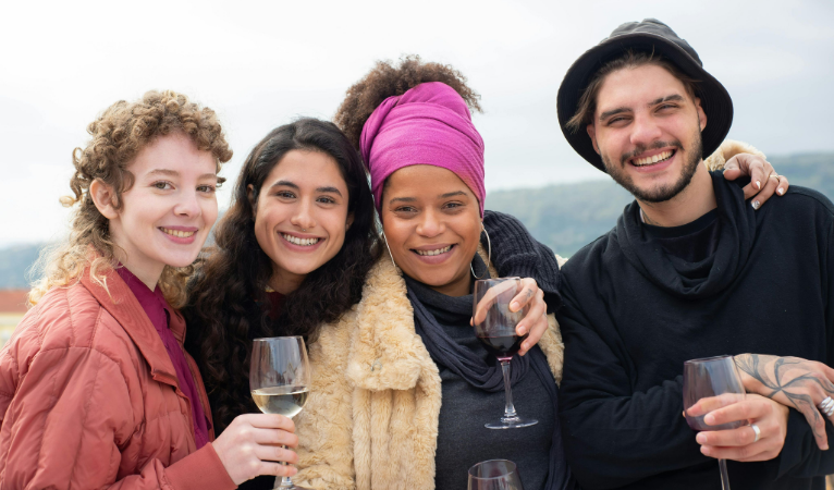 Happy gathering of four friends